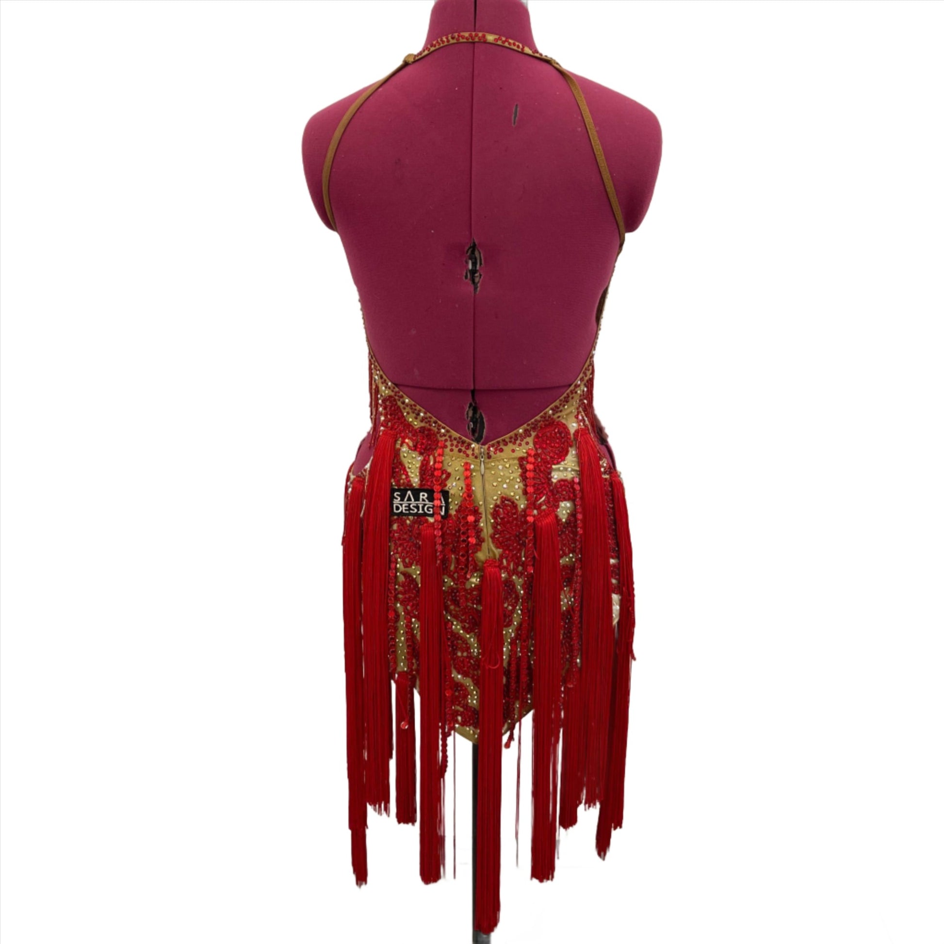 Gold and Vibrant Red Fringe Latin Dance Dress, Stunning gold and red fringe Latin dance dress adorned with crystals - perfect for competitions and performances. Shop now for exquisite dancewear at our online store.