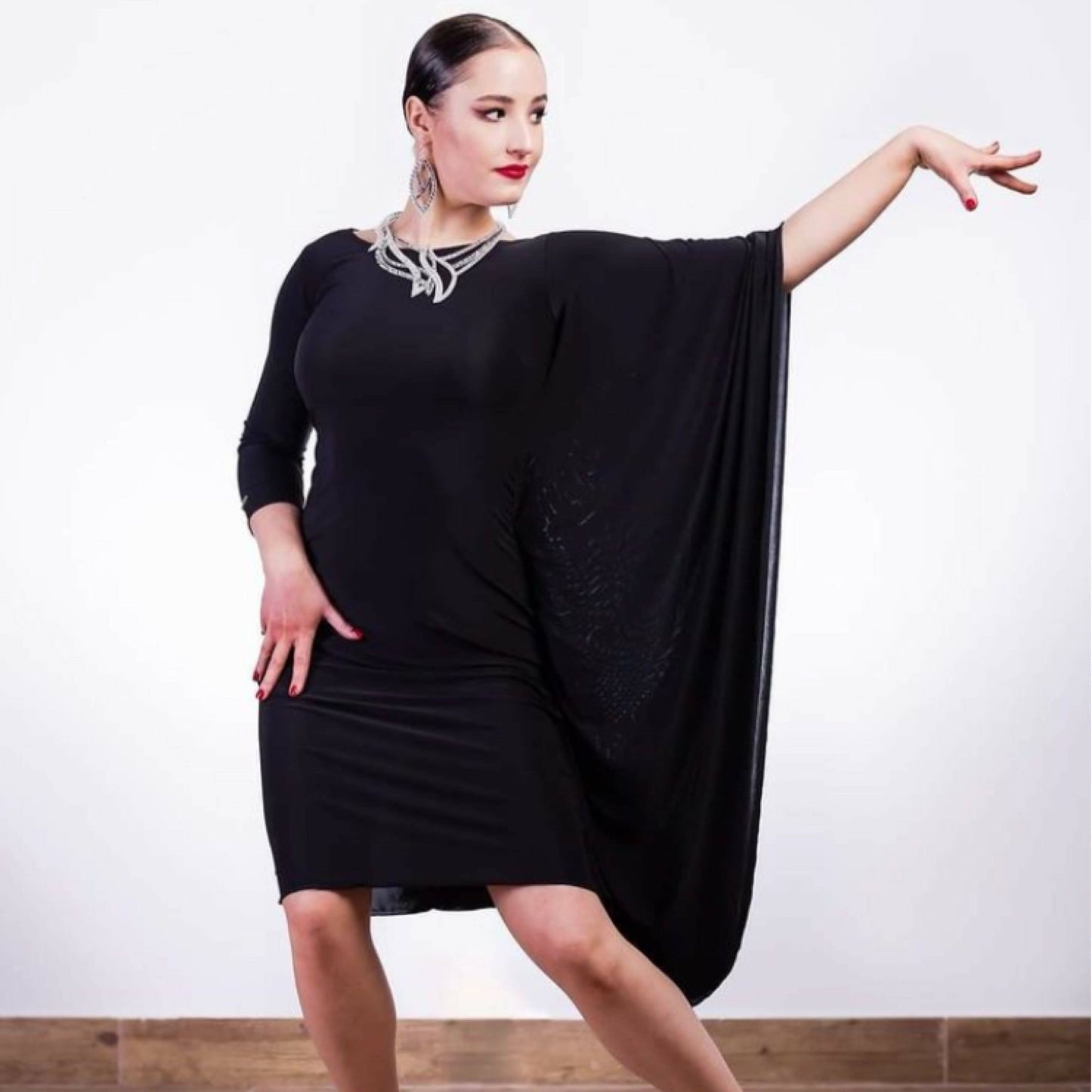 Elegant practice dress with one wide wavy sleeve for ballroom latin dancers